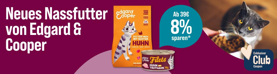 Spare 8 % ab 39 € auf Edgard & Cooper Werbebanner für Edgard & Cooper Katzennahrung mit dem Schriftzug „Neues Nassfutter von Edgard & Cooper“. Abgebildet sind ein Beutel und eine Dose Katzennassfutter der Marke Edgard & Cooper. Rechts blickt eine graue Katze neben einem Futternapf. Ein Hinweis hebt hervor: „Ab 39 € 8 % sparen*“. Zusätzlich wird ein exklusiver Club-Coupon beworben.
