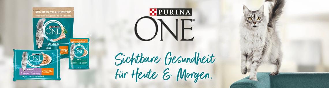 Purina One Topbanner Purina‑ONE‑Produkte neben einer Katze und dem Schriftzug „Sichtbare Gesundheit für Heute & Morgen“.