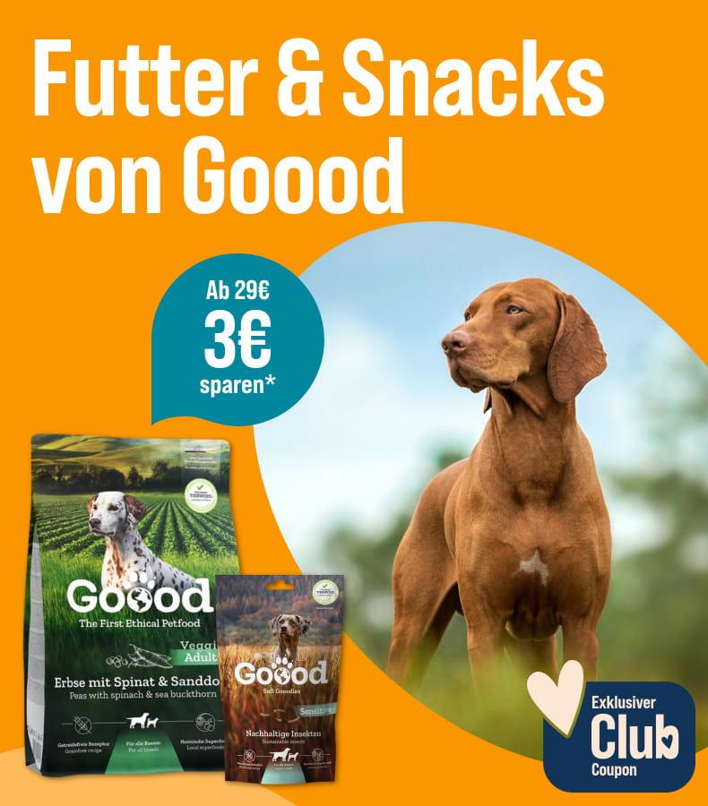 Spare 3 € ab 29 € auf Futter & Snacks von GOOOD Aktionsbanner für Goood Tierfutter. Mittig Produktverpackungen von Goood für Hunde, links Schriftzug „Futter & Snacks von Goood“ sowie Badge „Ab 29€ 3€ sparen“; rechts ein Hund im Freien auf einer Wiese; Hinweis: exklusiver Club-Coupon.