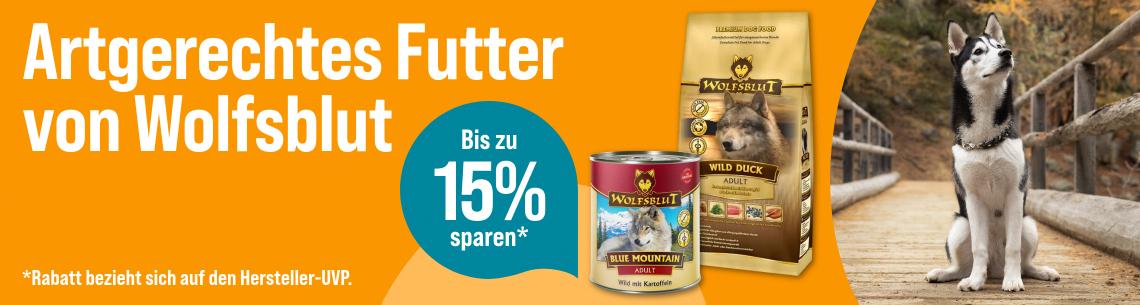 Spare bis zu 15 % auf Hundefutter von Wolfsblut Werbebanner für Wolfsblut Hundenahrung mit dem Schriftzug „Artgerechtes Futter von Wolfsblut“. Abgebildet sind ein Beutel Wolfsblut Wild Duck Adult Trockenfutter und eine Dose Wolfsblut Blue Mountain Adult Nassfutter. Rechts sitzt ein Husky auf einem Holzsteg in natürlicher Umgebung. Ein Hinweis hebt hervor: „Bis zu 15 % sparen*“. Fußnote: „*Rabatt bezieht sich auf die Hersteller-UVP.“