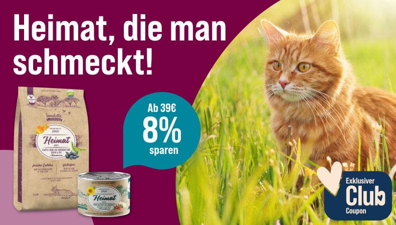 Spare 8 % ab 39 € auf Sanabelle Heimat Aktionsbanner für Sanabelle Heimat Katzenfutter. Links der Schriftzug „Heimat, die man schmeckt!“. Mittig abgebildet sind ein Beutel und eine Dose der Produktlinie Sanabelle Heimat. Daneben ein Hinweis „Ab 39 € 8 % sparen“. Rechts sitzt eine rote Katze auf einer Wiese. Unten rechts befindet sich ein Badge „Exklusiver Club Coupon“. Hintergrund in Magenta- und Rosatönen. Hinweis: Beim Kauf ausgewählter Sanabelle Heimat Produkte ab 39 € können mit Club Coupon 8 % gespart werden.**