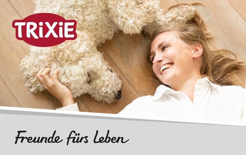 Trixie Topbanner Banner mit weißem Hund und TRIXIE‑Logo sowie dem Claim ‚Freunde fürs Leben‘.