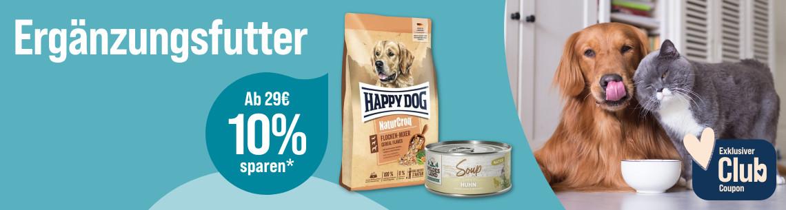Spare 10% ab 29€ auf Ergänzungsfutter Aktionsbanner für Ergänzungsfutter. Hund und Katze stehen nebeneinander vor einem Futternapf, daneben Verpackungen von Trocken‑ und Nassfutter, Hinweis auf 10 % Rabatt ab 29 € und exklusiven Club‑Coupon