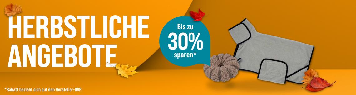 Spare bis zu 30 % auf ausgewähltes Hundezubehör Werbebanner für herbstliche Haustier-Angebote mit dem Schriftzug „Herbstliche Angebote“. Abgebildet sind ein grauer Hundebademantel und ein flauschiges Hundespielzeug. Dekorative Herbstblätter unterstreichen das saisonale Thema. Ein Hinweis hebt hervor: „Bis zu 30 % sparen*“. Fußnote: „*Rabatt bezieht sich auf die Hersteller-UVP.“